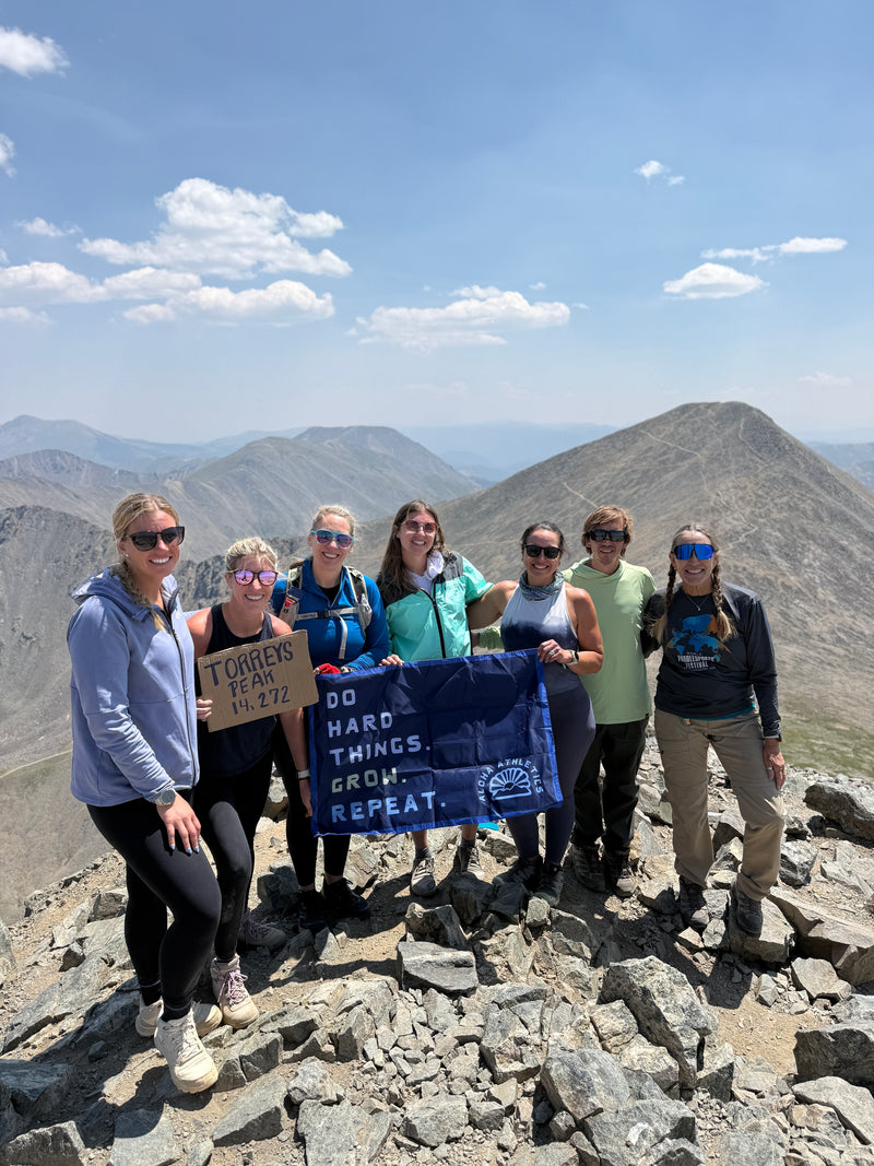Group hiking a Colorado 14er on an Aloha Athletics expedition